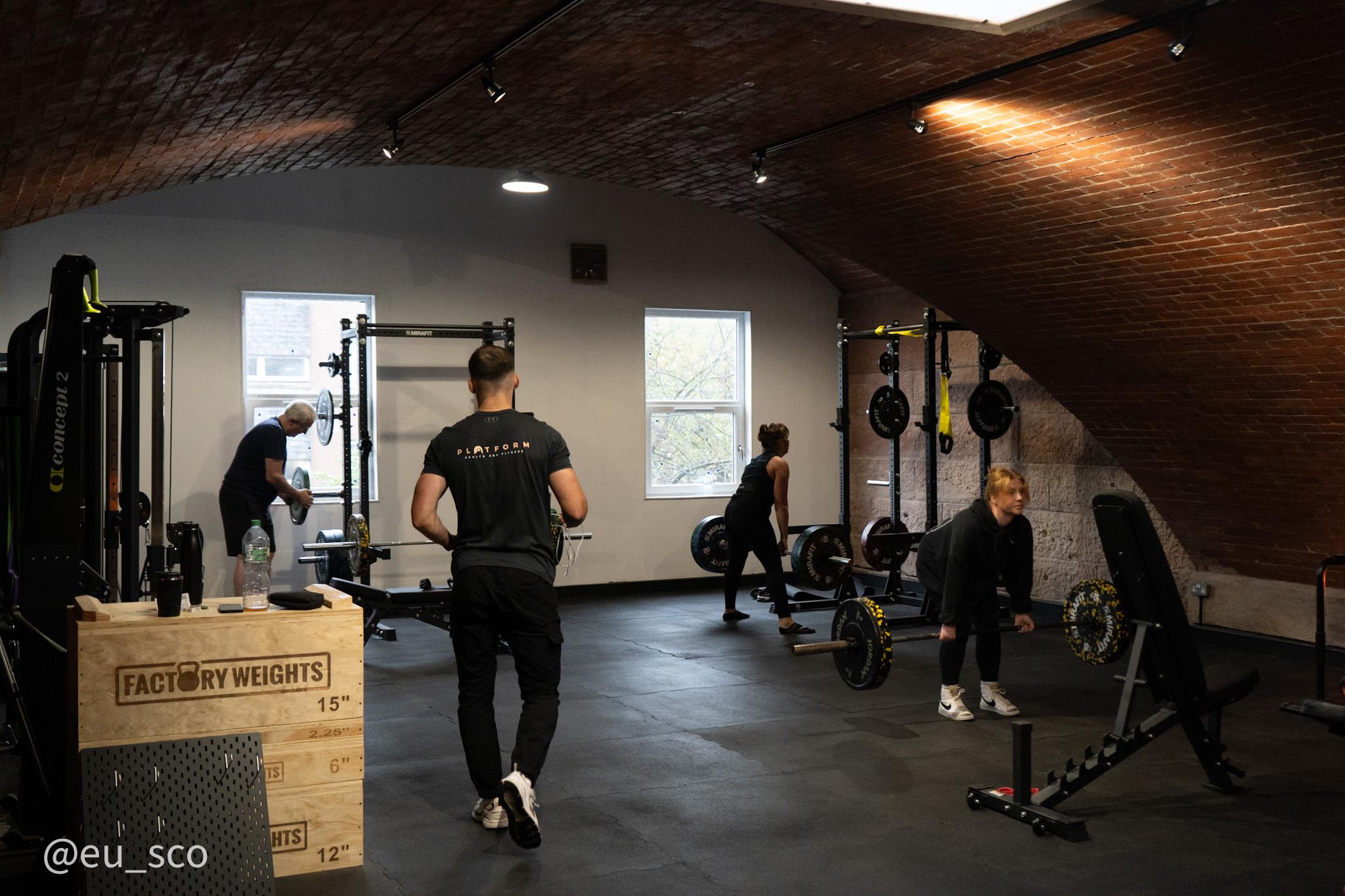 Coaches and clients training on the gym floor at Platform Health and Fitness, Edinburgh, where Jamie Henderson explains CIMSPA vs REPs for personal trainers